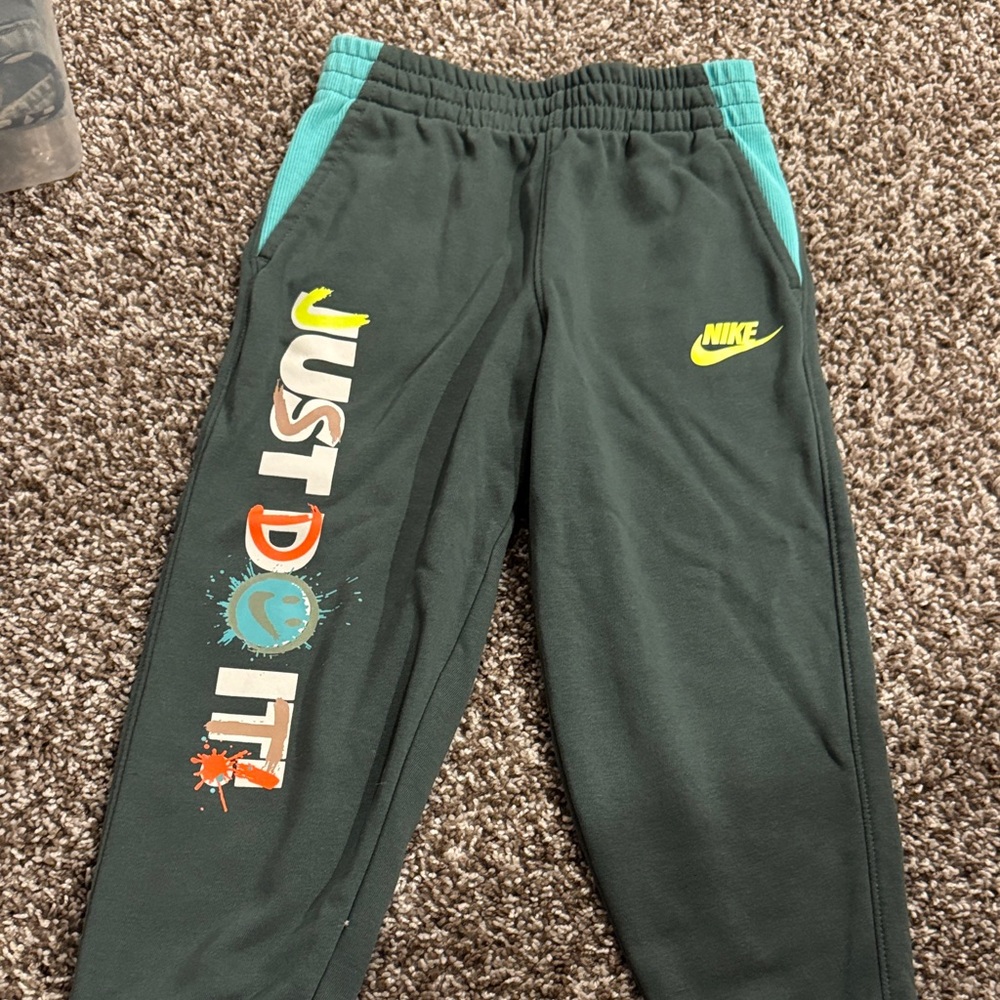 Nike Kids Black Joggers with Multicolor Print